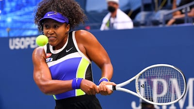 Naomi Osaka hits a backhand to Victoria Azarenka during the US Open final. EPA