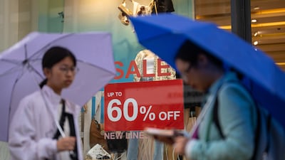 Sales can entice shoppers to unintentionally spend beyond their budget. Getty Images