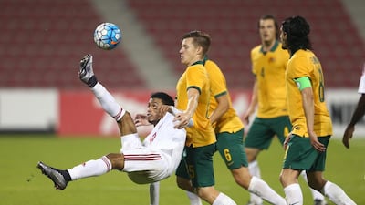 Mohamed Al Akberi of the UAE attempts an overhead kick during the AFC U23 Championship Group D match at Grand Hamad Stadium on January 14, 2016 in Doha, Qatar. Francois Nel/Getty Images