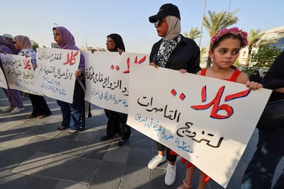 Activists demonstrate against marriage of underage girls in Baghdad's Tahrir Square in July last year as Parliament debated proposed amendments to Iraq's Personal Status Law. AFP