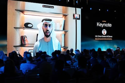 Omar Sultan Al Olama, UAE Minister for Artificial Intelligence, Digital Economy and Remote Work Applications, speaks during a summit in Abu Dhabi. The UAE was ahead of the curve and appointed the world’s first Minister of State for AI in 2017. Chris Whiteoak / The National