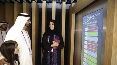 Sheikh Mohammed bin Rashid, Vice President and Ruler of Dubai, visits the UAE Pavilion at Milan Expo 2015 with the young actress Mahra Mustafa.