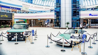 Abu Dhabi police's first generation Range Rover and a Porsche 924 on display in Abu Dhabi's Marina Mall. Seven Media