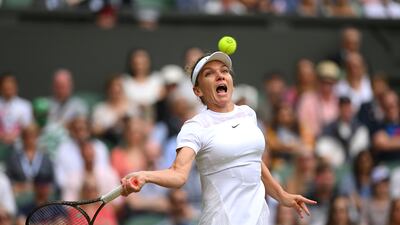 Simona Halep of Romania plays a shot at the All England Club. Getty
