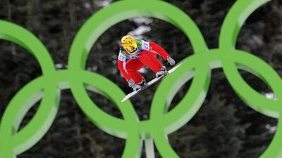 Mellie Francon of Switzerland competes during the Women's Snowboard cross qualifications at Cypress Mountain during the Vancouver Winter Olympics, north of Vancouver on February 16, 2010. AFP PHOTO / MARTIN BUREAU