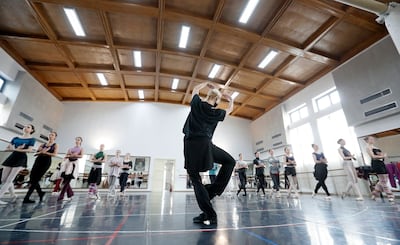A Romanian choreography instructor directs the ballet dancers of the Bucharest National Opera and their refugee guests for a rehearsal session in Bucharest, Romania, on March 15. EPA