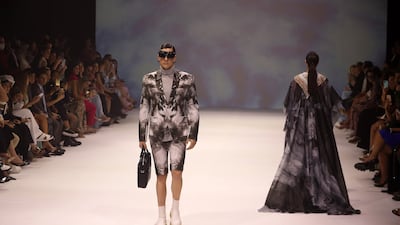 A male model in the Michael Cinco show at Arab Fashion Week held at D3 in Dubai.