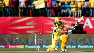 Chennai Super Kings batter MS Dhoni is bowled out by Punjab Kings' Harshal Patel for a golden duck. AFP