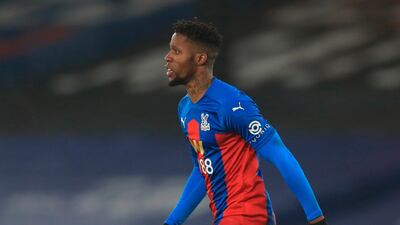 Wilfried Zaha celebrates after scoring against Leicester City. EPA