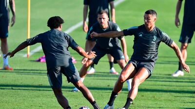 Cristiano Ronaldo training with teammates. AFP