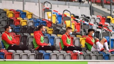 Dusseldorf's substitutes players on the bench. AFP