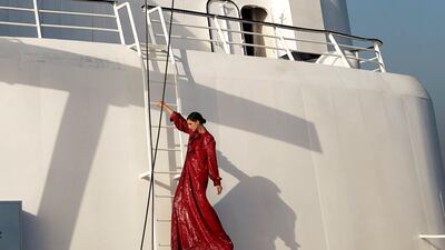 Superstructure: Sequined dress, Dh63,600, Gucci; Earrings Dh826, Elsa O; Shoes, Dh550 Tommy Hilfiger.