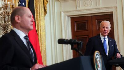 US President Joe Biden, right, holds a joint news conference with German Chancellor Olaf Scholz at the White House. Reuters