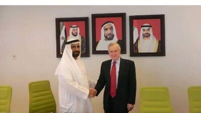 Dr Fred Moavenzadeh, the president of the Masdar Institute for Science and Technology receives donation from the retired General Mohammed Salem bin Kardous al Ameri. Courtsey of Masdar Institute