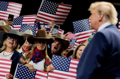 Republican supporters cheer on US President Donald Trump in Dallas. Reuters