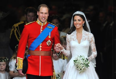 Britain's Prince William and Catherine, Duchess of Cambridge, are seen walking after their wedding ceremony in Westminster Abbey. TPX