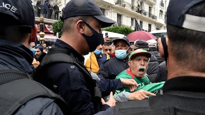 An elderly man confronts police officers during a demonstration in the Algerian capital Algiers, marking the second anniversary of the country’s anti-government Hirak protest movement. AFP