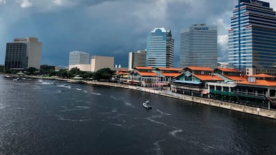 The Coast Guard and local law enforcement patrol the St. Johns River outside The Jacksonville Landing. AP Photo