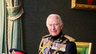 Britain's King Charles III poses for a picture while wearing his field marshal No1 full ceremonial frock coat with medals, sword and decorations. Reuters