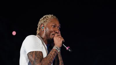 US rapper Future performs on stage at Jeddah World Festival . / AFP / AMER HILABI