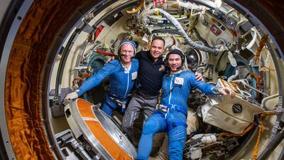 Roscosmos cosmonauts, from left; Oleg Artemyev, Sergey Korsakov and Denis Matveev, inside the International Space Station's Poisk module in April 2021. Photo: Nasa