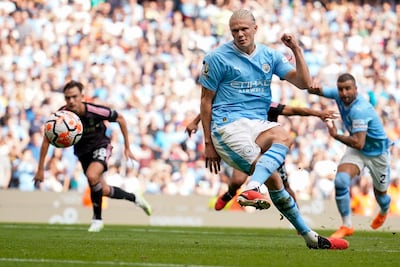 Erling Haaland scores Manchester City's fourth goal from penalty spot against Fulham at the Etihad Stadium. AP