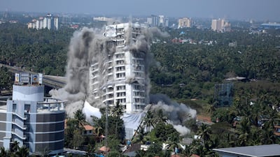 The Holy Faith H2O apartment block is brought to the ground by controlled implosion in Kochi on Saturday. The block was one of four that was brought down for breaching coastal conservation regulations. AP Photo