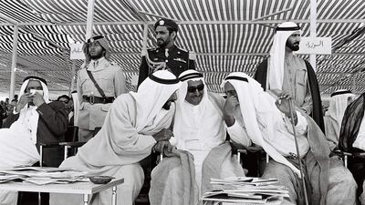 Sheikh Zayed watches a military ceremony for the fourth National Day in 1975. Photo: Ittihad