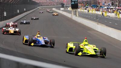 Simon Pagenaud leads the field on his way to victory in the Indianapolis 500. Dubai-born Ed Jones was 13th. AP Photo
