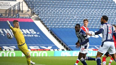 West Bromwich Albion' striker Mbaye Diagne heads past Southampton goalkeeper Fraser Forster but after a VAR review an offside decision ruled the goal out. AFP