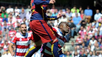 Gerard Pique of Barcelona heads the ball during the La Liga match between Granada and Barcelona at Estadio Nuevo Los Carmenes on May 14, 2016 in Granada, Spain. (Photo by Denis Doyle/Getty Images)