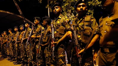 Armed Sri Lanka Police Special Task Force personnel and unarmed policemen stand guard in front of the Supreme Court in Colombo, Sri Lanka, 13 November 2018. EPA