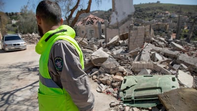 A paramedic at the site of an Israeli air strike in the southern Lebanese village of Odaisseh near the border with Israel. AFP