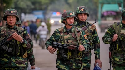 Vietnamese soldiers stand guard outside of Dong Dang railway station. Getty Images