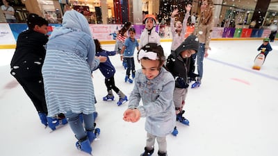 The artificial snowflakes melt immediately when touching any surface. Chris Whiteoak / The National