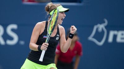 Belinda Bencic celebrates during her Toronto victory on Sunday over Simona Halep at the WTA Canadian Open. Geoff Robins / AFP / August 16, 2015