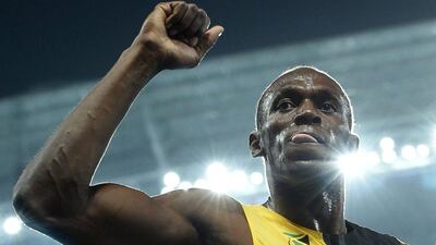 Usain Bolt celebrates after he won the men’s 100m final during the Rio 2016 Olympics at the Olympic Stadium in Rio de Janeiro on August 14, 2016. Toshifumi Kitamura / AFP