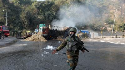 An Indian Army soldier near Jammu city, where four militants were killed last week by security forces who stopped a suspicious lorry. AP