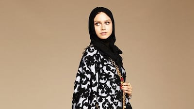The abayas incorporate lace, white polka dots and sheer panels. Courtesy Dolce & Gabbana