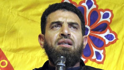 Mahmoud Al Werfalli is seen here speaking in the eastern Libyan city of Benghazi on January 26, 2017. Abdullah Doma / AFP