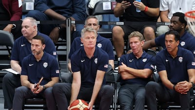 USA coach Steve Kerr holds tha ball during the game.