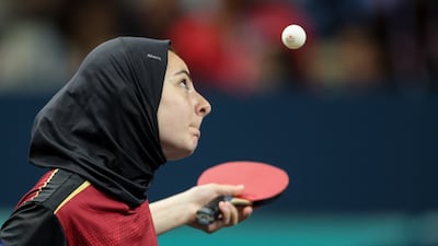Dina Meshref of Egypt prepares to serve. EPA