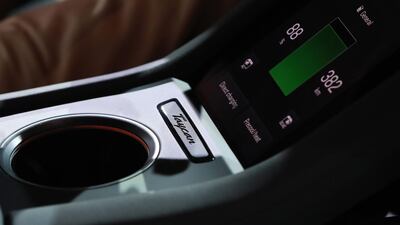 Battery level information is displayed on a center console screen inside the all electric Porsche AG Taycan luxury automobile. Bloomberg