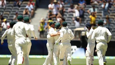 Australia's cricketers celebrate their victory over India in the second Test in Perth. Getty Images