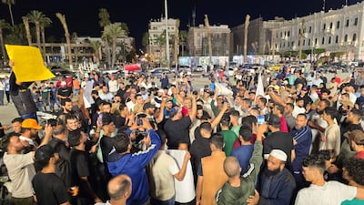 Protesters call for the resignation of Prime Minister Abdulhamid Dbeibah in Tripoli on Saturday. AFP