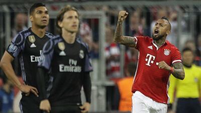 Arturo Vidal celebrates scoring the opening goal. Matthias Schrader / AP Photo