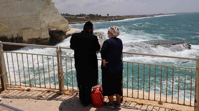 A Jewish couple visit the Rosh Hanikra grottoes at the Israeli-Lebanese border in Rosh Hanikra. AFP