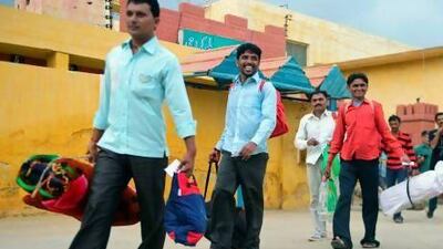 Indian fishermen leave a jail after their release in Karachi. Rizwan Tabassum / AFP