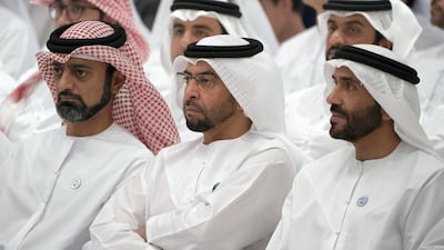 Sheikh Ammar bin Humaid, Sheikh Hamdan bin Zayed, Ruler’s Representative in Al Dhafra Region and Sheikh Nahyan bin Zayed, Chairman of the Board of Trustees of Zayed bin Sultan Al Nahyan Charitable and Humanitarian Foundation attend a lecture by Razan Al Mubarak on Wednesday. Hamad Al Kaabi / Crown Prince Court - Abu Dhabi