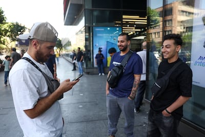 An Iranian man on his phone in Tehran after the reported resumption of international internet access. Reuters